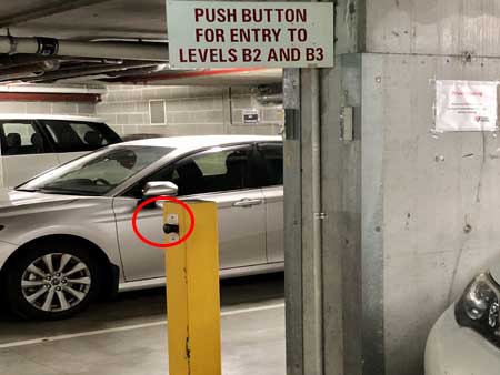 Press this button on B1 to go to B2 and B3 | APX Darling Harbour | hotel parking instruction