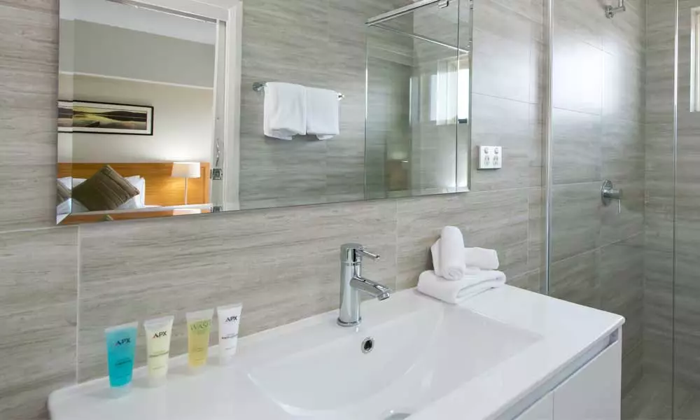APX Hotels Apartments Parramatta clean and comfortable bathroom area in Parramatta CBD Australia