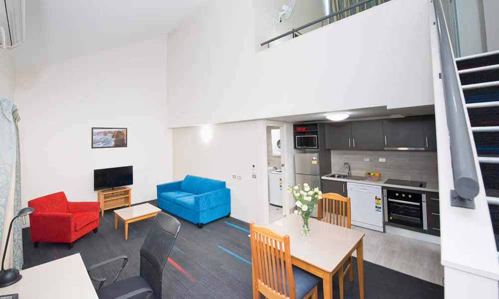 APX Hotels Apartments Parramatta living and dining area in every apartments accommodation in Parramatta CBD Australia