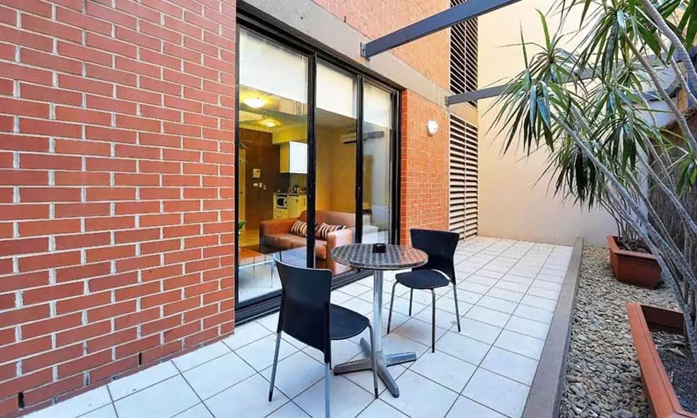 APX Darling Harbour clean and spacious courtyard in executive studio apartment accommodation in Sydney Australia