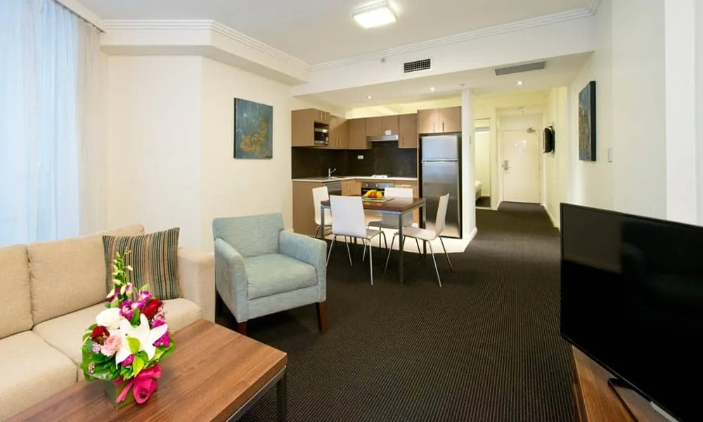 living room, kitchenette and dining area | Sydney apartments | Sydney hotels | APX World Square | Australia
