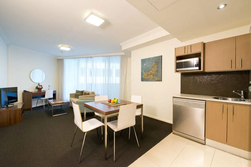 APX Hotels Apartments living dining kitchen room at APX World Square Sydney Australia