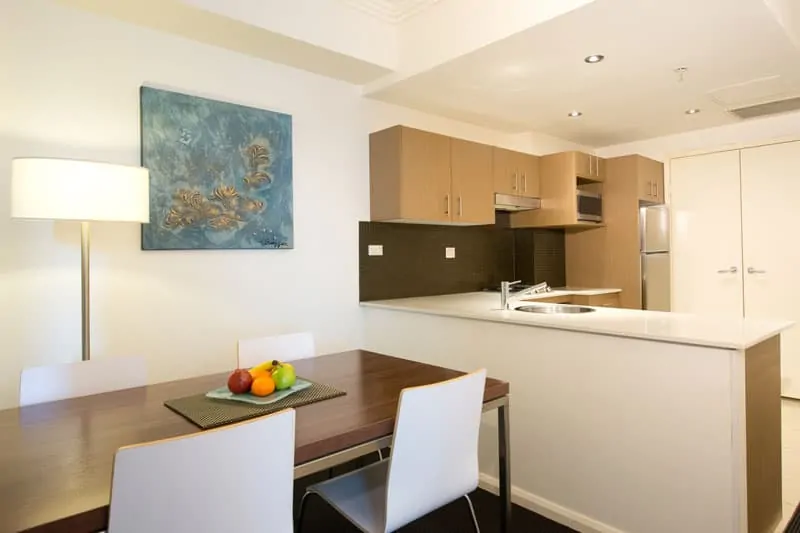 APX World Square kitchen and dining area in APX Hotels Apartments Sydney Australia