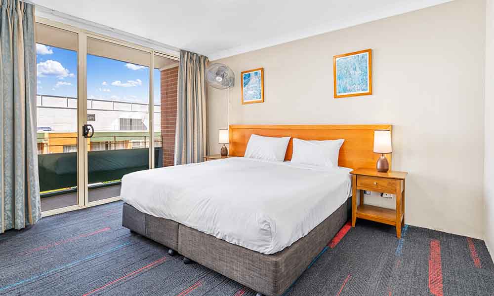 King Bed in 3 Bedroom apartment at APX Hotels Apartments Parramatta | affordable accommodation in Parramatta CBD Australia