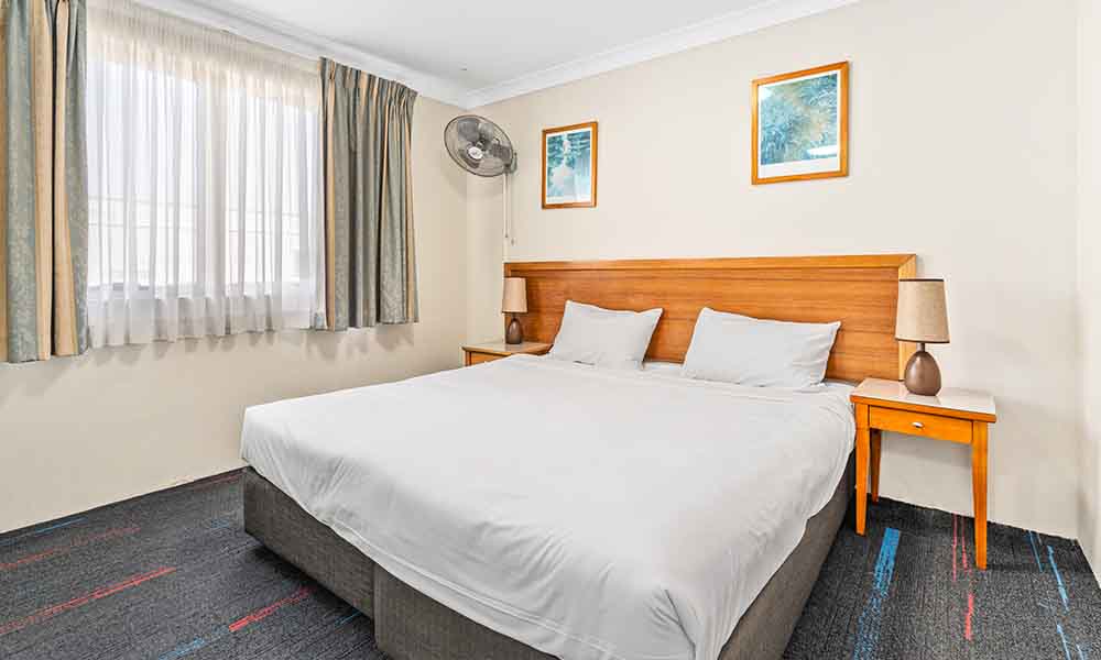 King Bed | Executive 2 Bedroom apartment at APX Hotels Apartments | APX Parramatta | affordable accommodation in Parramatta CBD Australia