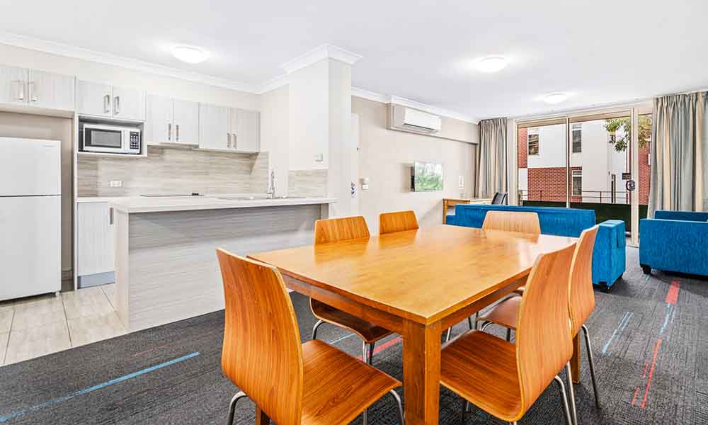 APX Hotels Apartments Parramatta clean and comfortable three bedroom dining area in Parramatta CBD Australia